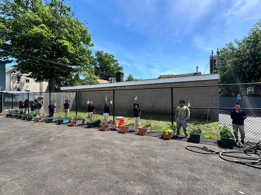 A photo of students in the garden