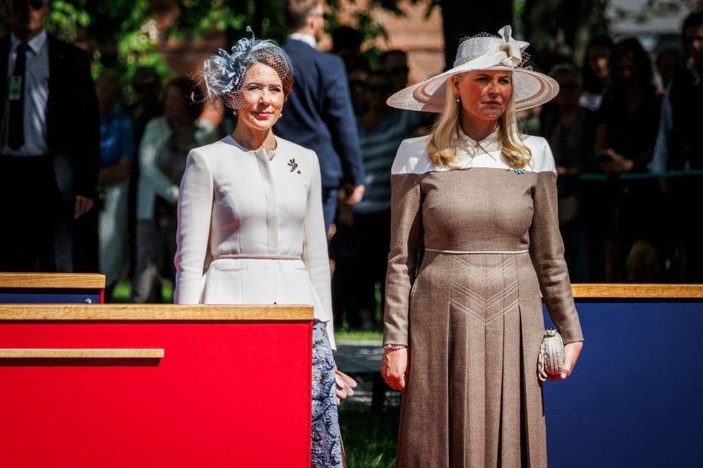 Queen Mary and Queen Mette-Marit  at the National Monument at Akershus Fortress on May 14, 2024 in Oslo, Norway.