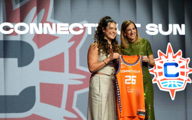 NEW YORK, NEW YORK - APRIL 13: Charlisse Leger-Walker (L) of UCLA poses with WNBA Commissioner Cathy Engelbert (R) after being selected with the 18th pick in the second round by the Connecticut Sun during the 2026 WNBA Draft at The Shed on April 13, 2026 in New York City. NOTE TO USER: User expressly acknowledges and agrees that, by downloading and or using this photograph, User is consenting to the terms and conditions of the Getty Images License Agreement. (Photo by Angelina Katsanis/Getty Images)