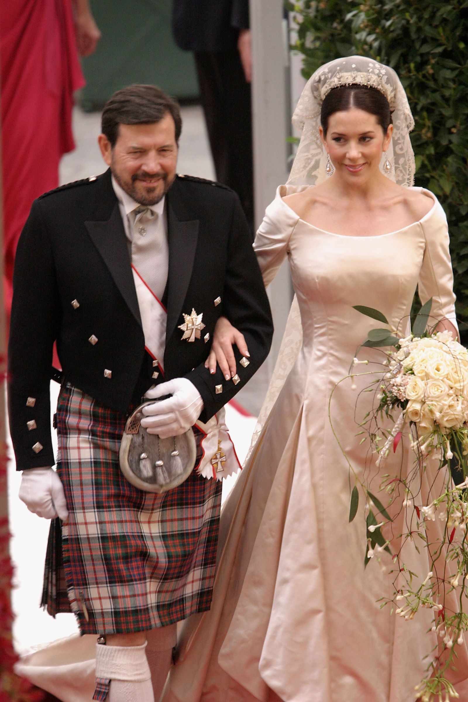Image may contain Sebastian Koch Mary Crown Princess of Denmark Clothing Skirt Person Tartan Adult Wedding and Face