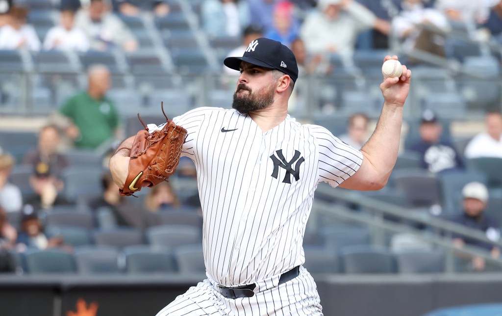Yankees pitcher Carlos Rodon throws a pitch during the first inning of game one of a split doubleheader against the Tampa Bay Rays at Yankee Stadium in the Bronx, N.Y., Tuesday, Sept. 22, 2026.