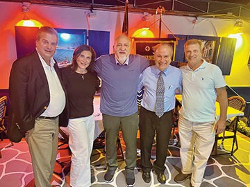 (L. to r.): New members George and Felicia Elliott, Jerry Chrisafis, Paul Halvatzis. and new member John Fucich.