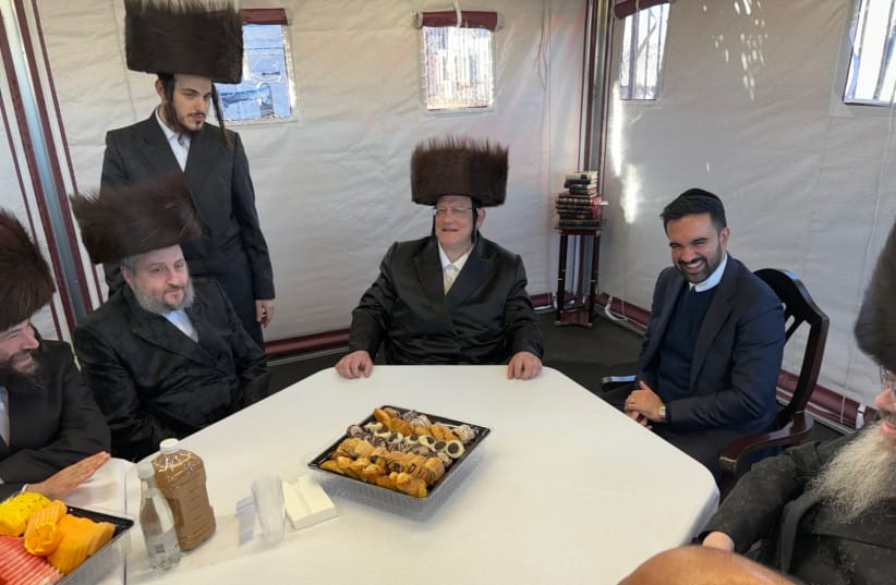 New York City mayoral candidate Zohran Mamdani (R) visits a sukkah of Satmar community leaders in Williamsburg, Brooklyn, October 10, 2025; illustrative. (credit: SCREENSHOT/X/@ZOHRANKMAMDANI)