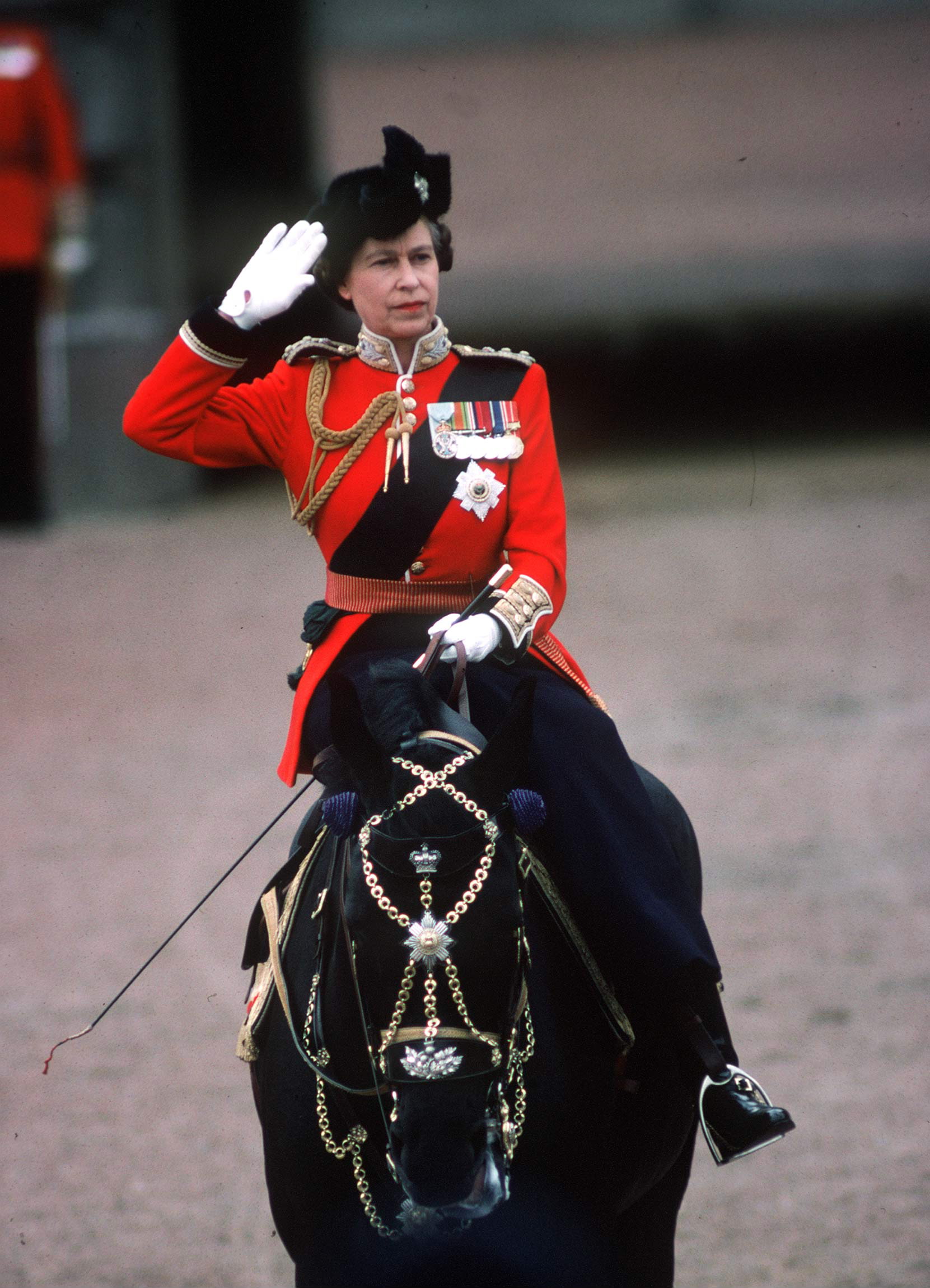 Queen Elizabeth saluting on. her horse Burmese at Trooping the Colour 1979