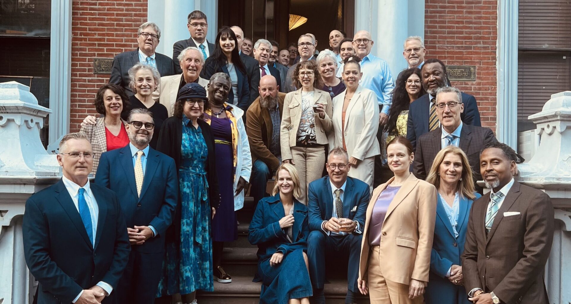 Members of the judiciary and the bar gather for a photo on the steps of the historic 123 Remsen St. Photo: Wayne Daren Schneiderman/Brooklyn Eagle