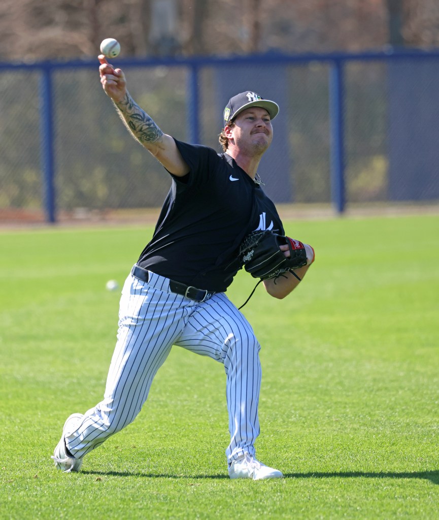 New York Yankees pitcher Chase Hampton throws a ball during spring training.