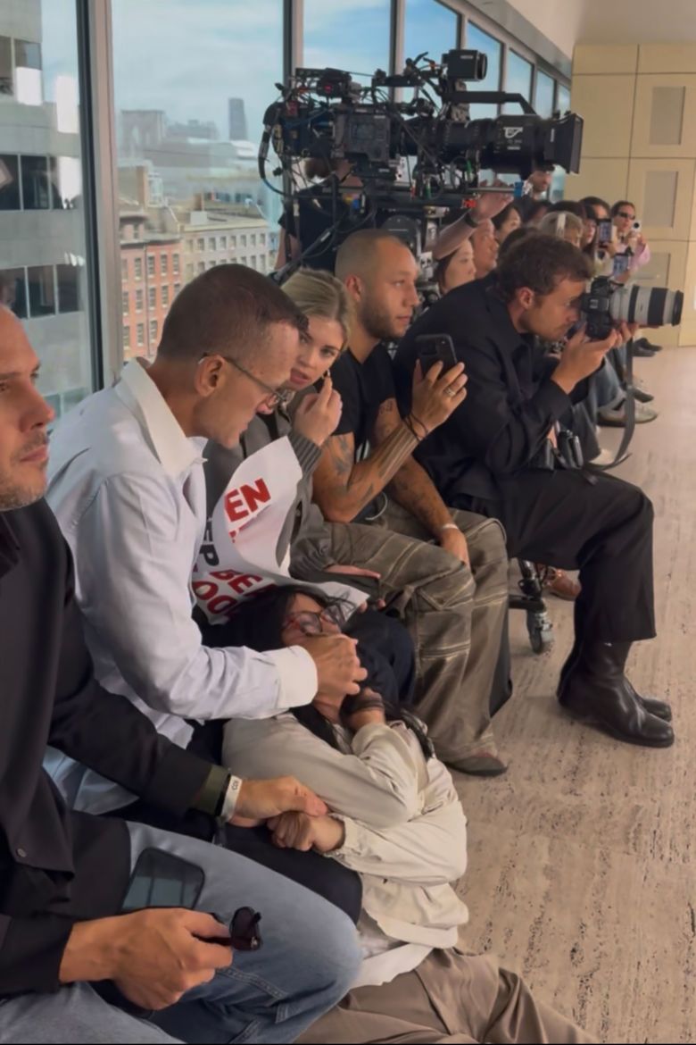 Kolb was also seen covering protesters' mouths as they shouted slogans.
