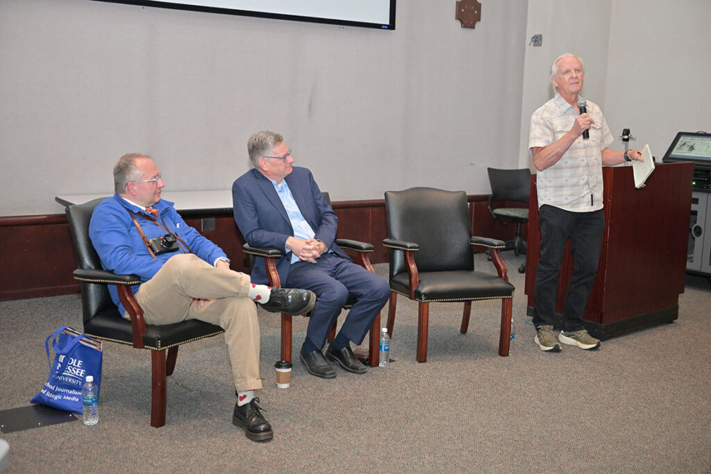 From left to right, photojournalist Joe DiPetro, News Channel 5 reporter Ben Hall and retired Tennessean reporter and Middle Tennessee State University School of Journalism and Strategic Media professor Leon Alligood share their memories of covering the 9/11 terror attacks with MTSU students, faculty and staff on Sept. 10, 2026, inside the State Farm Room located in the Business and Aerospace Building on campus in Murfreesboro, Tenn. They spoke ahead of the 25th anniversary of the 9/11 attacks. (MTSU photo by James Cessna)