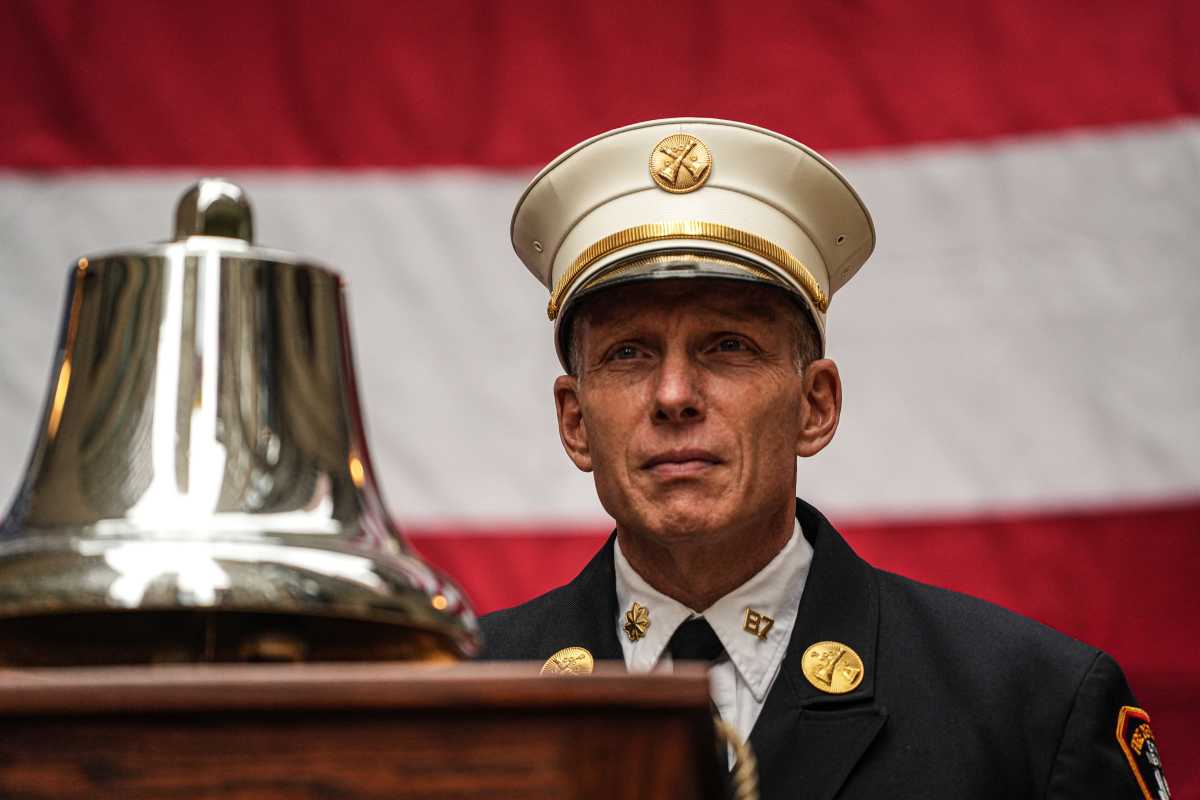 As they have done in past years, firefighters tolled a bell for the company members killed on 9/11, displayed flowers and made other tributes to those who made the ultimate sacrifice in running into the World Trade Center when everyone else ran out.