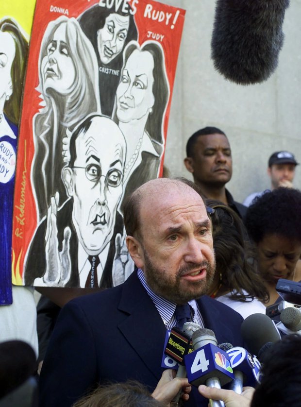Lawyer Raoul Felder, who represents New York Mayor Rudolph Giuliani in his divorce case, answers questions after a court hearing in New York on Friday, May 11, 2001. (AP Photo/Richard Drew)