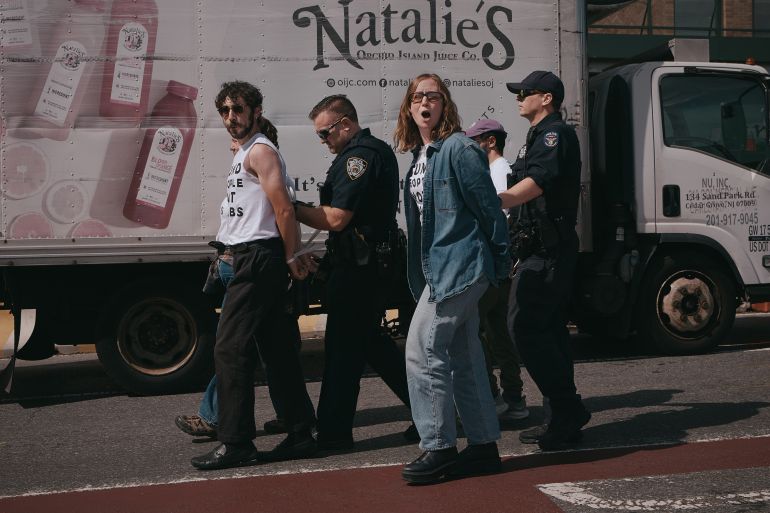 Police arrest protesters as they block a road outside United Nations headquarters during a Jewish Voice for Peace sit-in against Israeli Prime Minister Benjamin Netanyahu, Thursday, Sept. 24, 2026, in New York. (AP Photo/Andres Kudacki)