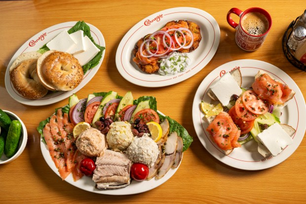 Appetizing with the Sarri combination fish platter, latkes and more will be available at the newly reopened Carnegie Deli in Midtown Manhattan. (Photo by Evan Sung)