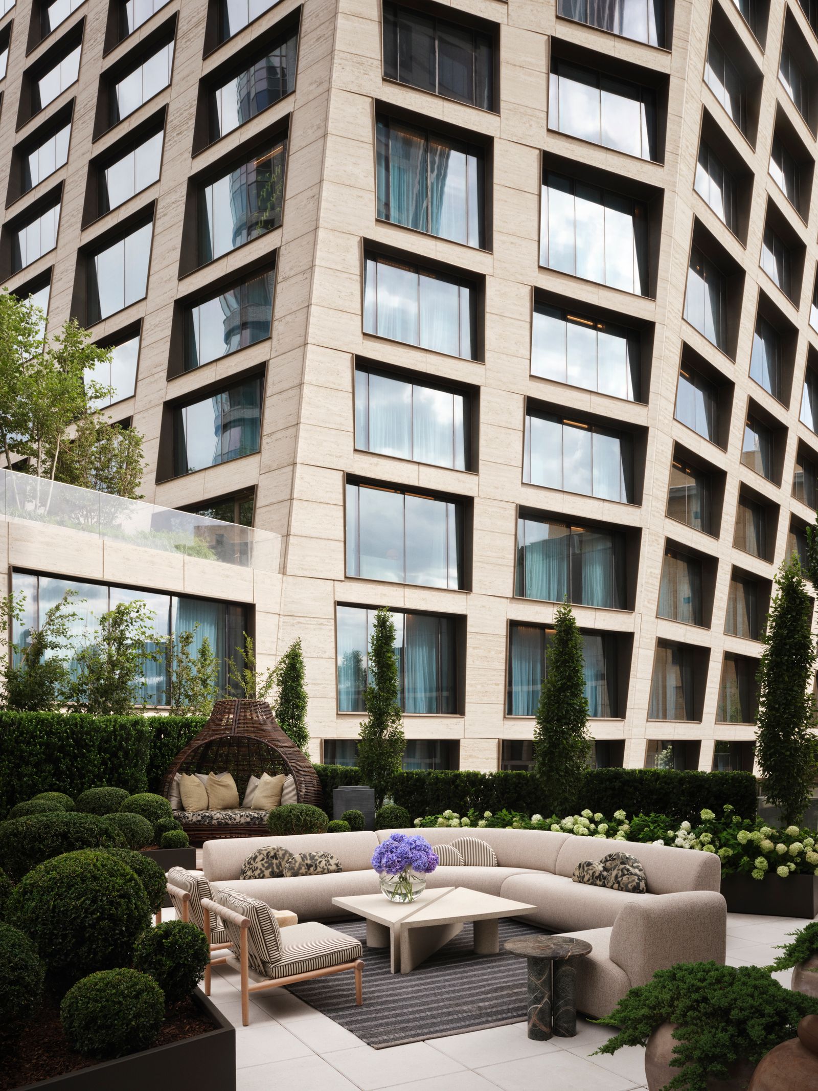 Image may contain City Architecture Building Condo Housing High Rise Urban Apartment Building and Office Building