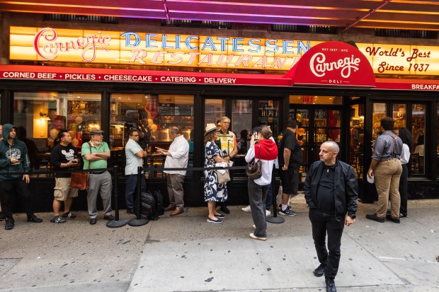 A line formed outside Carnegie Deli during the restaurant's opening on Sept. 15, 2026.