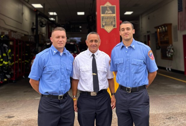 FDNY Chief Joseph Downey with his sons, Joseph (left) and Connor (right). (FDNY)