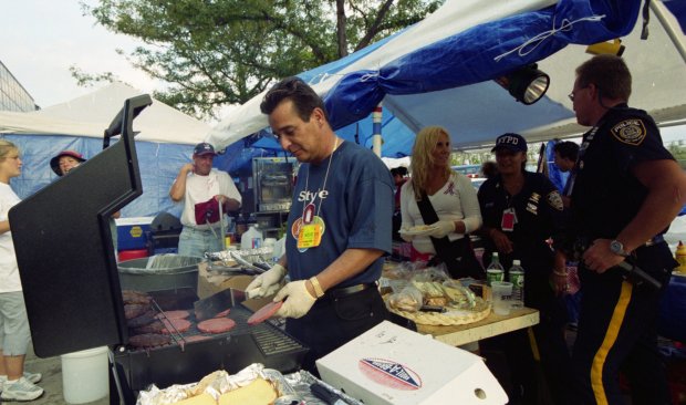 People volunteer at a site for rescue workers to get food and supplies outside the Javits Center in Manhattan on Sept. 21, 2001. (Heidi Schumann for New York Daily News)