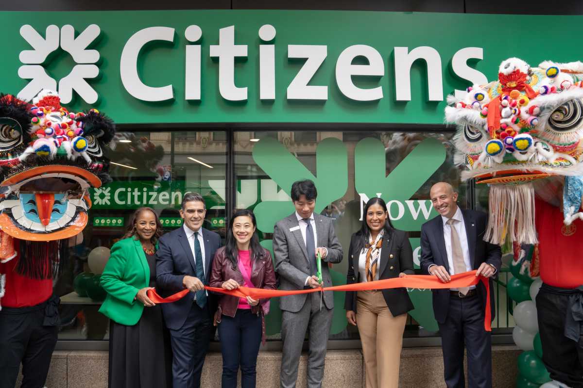 Council Member Sandra Ung joins Citizens representatives at the opening of the new Downtown Flushing branch.