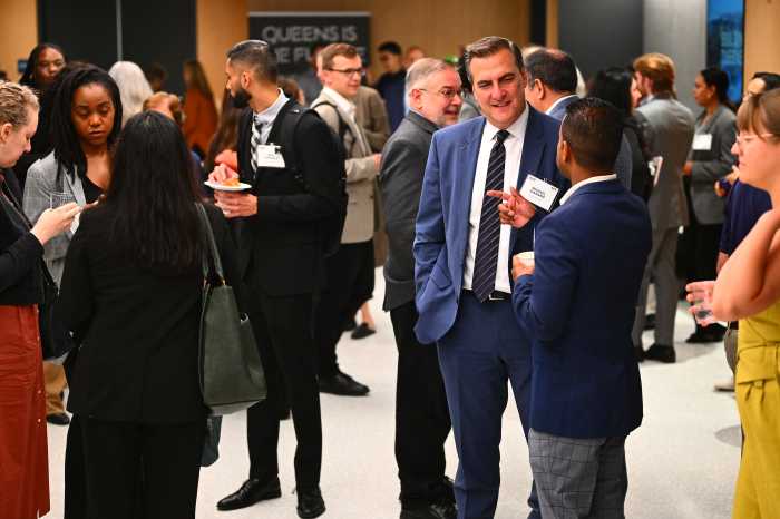 Networking at Tuesday's conference. Photo by Ramy Mahmoud.
