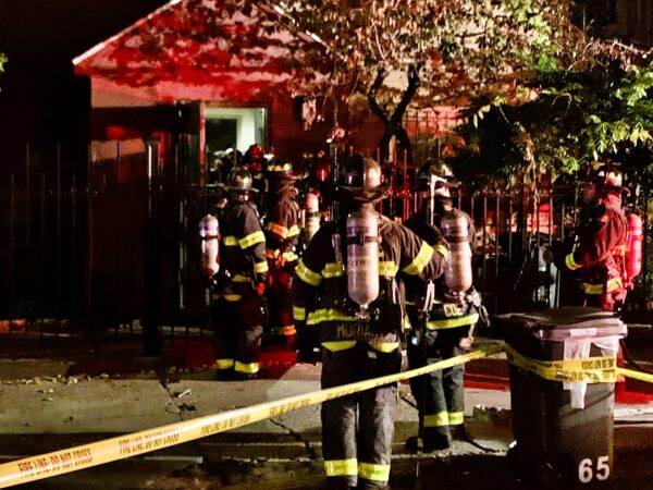 Numerous firefighters swept into 65 Middagh St. after a dangerous level of carbon monoxide gas was detected following a transformer fire. Photo: Mary Frost/Brooklyn Eagle
