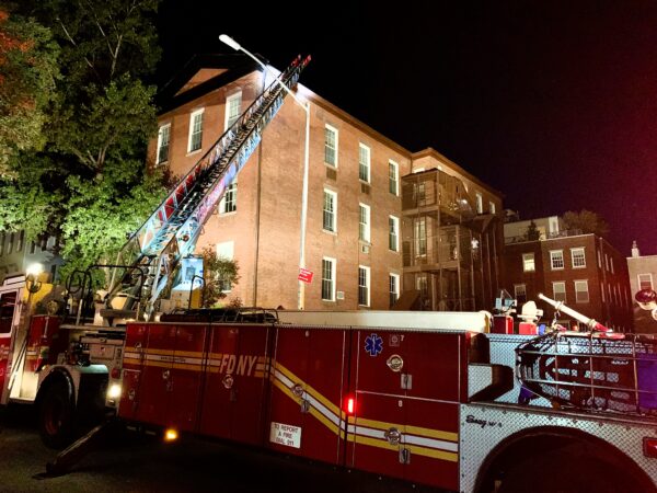 A ladder truck in front of 65 Middagh St. Saturday night in Brooklyn Heights. Photo: Mary Frost/Brooklyn Eagle