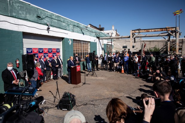 Rudy Giuliani speaks to the media at a press conference held in the back parking lot of Four Seasons Total Landscaping in Philadelphia on November 7, 2020, minutes after news networks announced that Joe Biden had won the presidency over Donald Trump. 