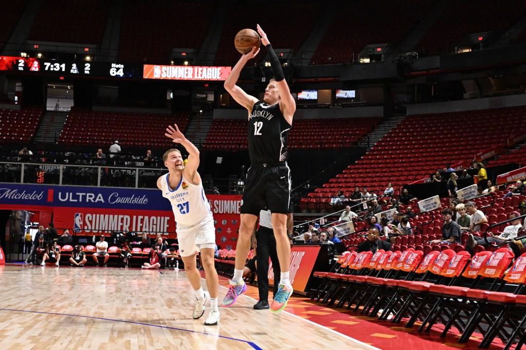 Ben Humrichous #12 of the Brooklyn Nets three point basket against the Oklahoma City Thunder 