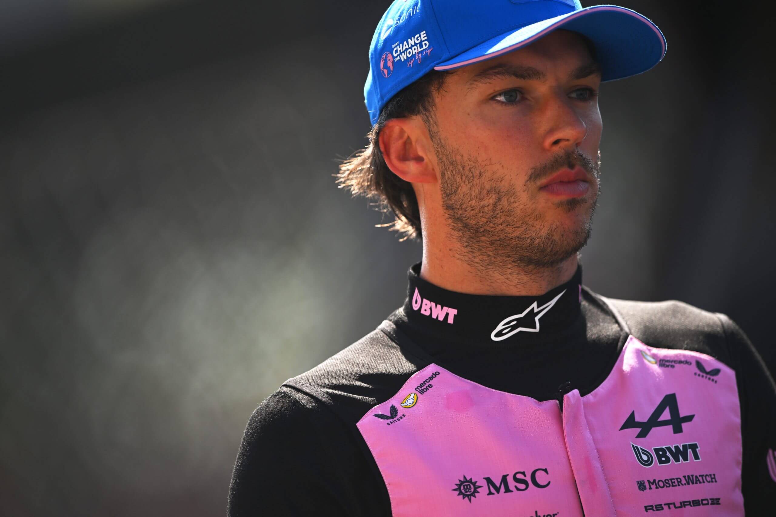 Pierre Gasly, wearing a blue cap, looks on ahead of the Italian Grand Prix