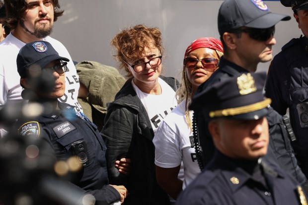 New York City Police Department (NYPD) officers detain US actress Susan Sarandon and pro-Palestinian demonstrators who were blocking First Avenue near the United Nations headquarters building, ahead of Israel's Prime Minister Benjamin Netanyahu's address to the 81st United Nations General Assembly in New York, on September 24, 2026. (Photo by CHARLY TRIBALLEAU / AFP via Getty Images)