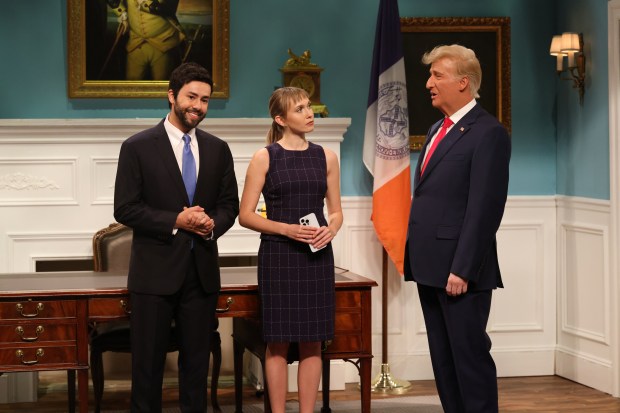 From left, Ramy Youssef as Zohran Mamdani, Veronika Slowikowska, and James Austin Johnson as Donald Trump during the "Trump Mamdani Cold Open" on "Saturday Night Live," Sept. 26, 2026. (Photo by: Will Heath/NBC via Getty Images)