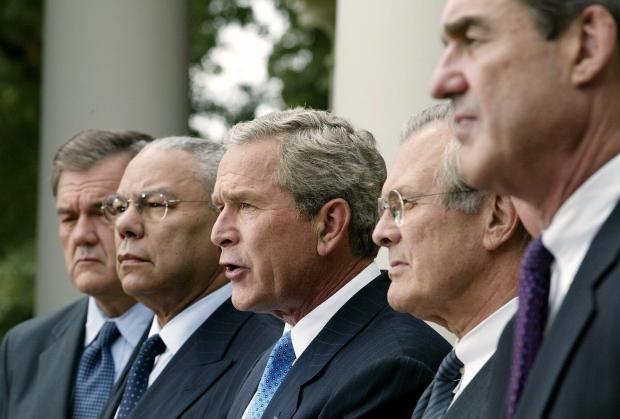 WASHINGTON, UNITED STATES: (FILES) This file photo released 04 November 2004, shows US President George W. Bush (C) as he called for the creation of a national counter-terrorism center that would serve as a "knowledge bank" for information about known and suspected terrorists during a Rose Garden press conference 02 August 2004 at the White House in Washington, DC. Seen in this photo L-R are: Homeland Security Director Tom Ridge, Secretary of State Colin Powell, Bush, Secretary of Defense Donald Rumsfeld and FBI Director Robert Mueller. As congratulations flowed in from around the world, Bush appeared set for second-term changes in his cabinet with Attorney General, John Ashcroft, 62, and Homeland Security Secretary, Tom Ridge, 59, likely to step down for personal reasons, The New York Times said 04 November citing government officials. Other members of the Bush cabinet who are also expected to leave their posts in the next four years are Secretary of State, Colin Powell, 67, and Defense Secretary, Donald Rumsfeld, 72. (Photo credit should read STEPHEN JAFFE/AFP via Getty Images)