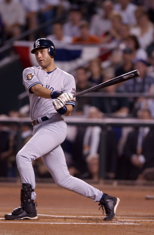 Derek Jeter #2 of New York Yankees swings during game six of the World Series.