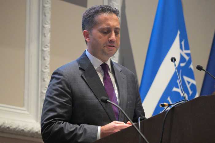 man standing at a podium
