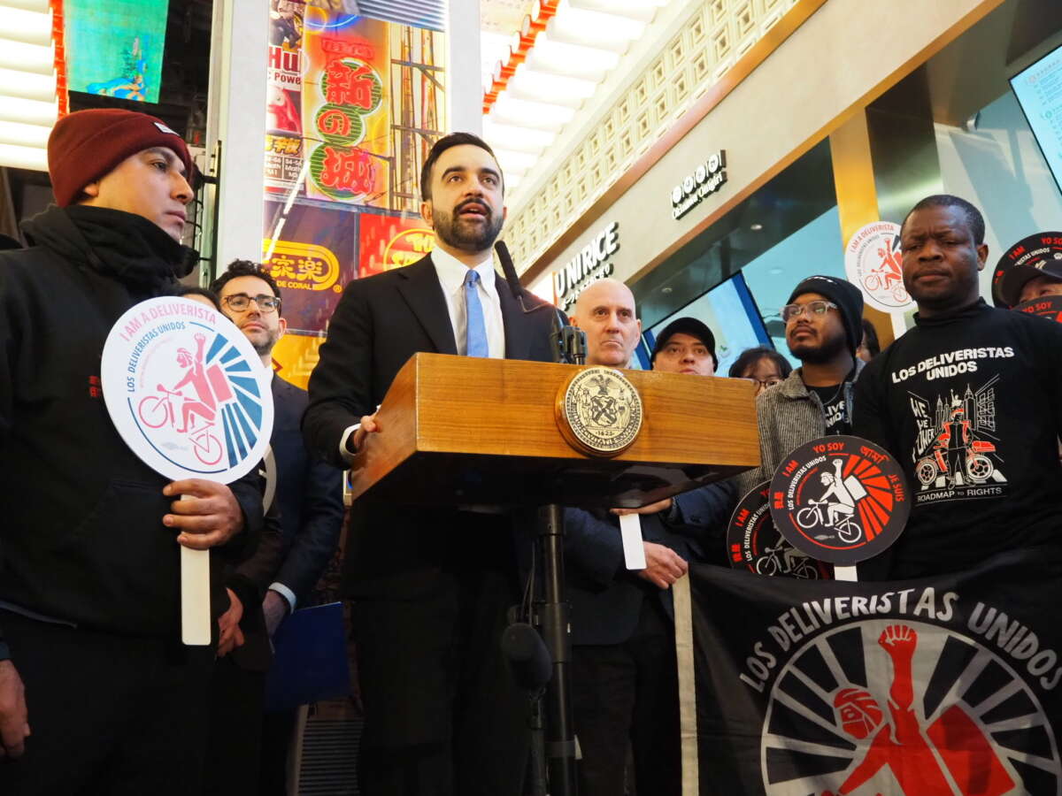 Mayor Zohran Mamdani announces a settlement with three delivery app companies at a news conference at Long Island City Food Hall.
