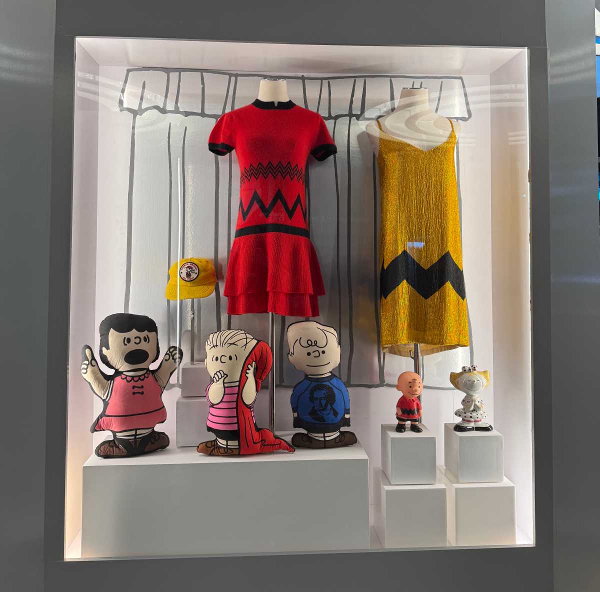 An installation at Snoopy In Style NYC highlighting the influence of Peanuts on fashion.