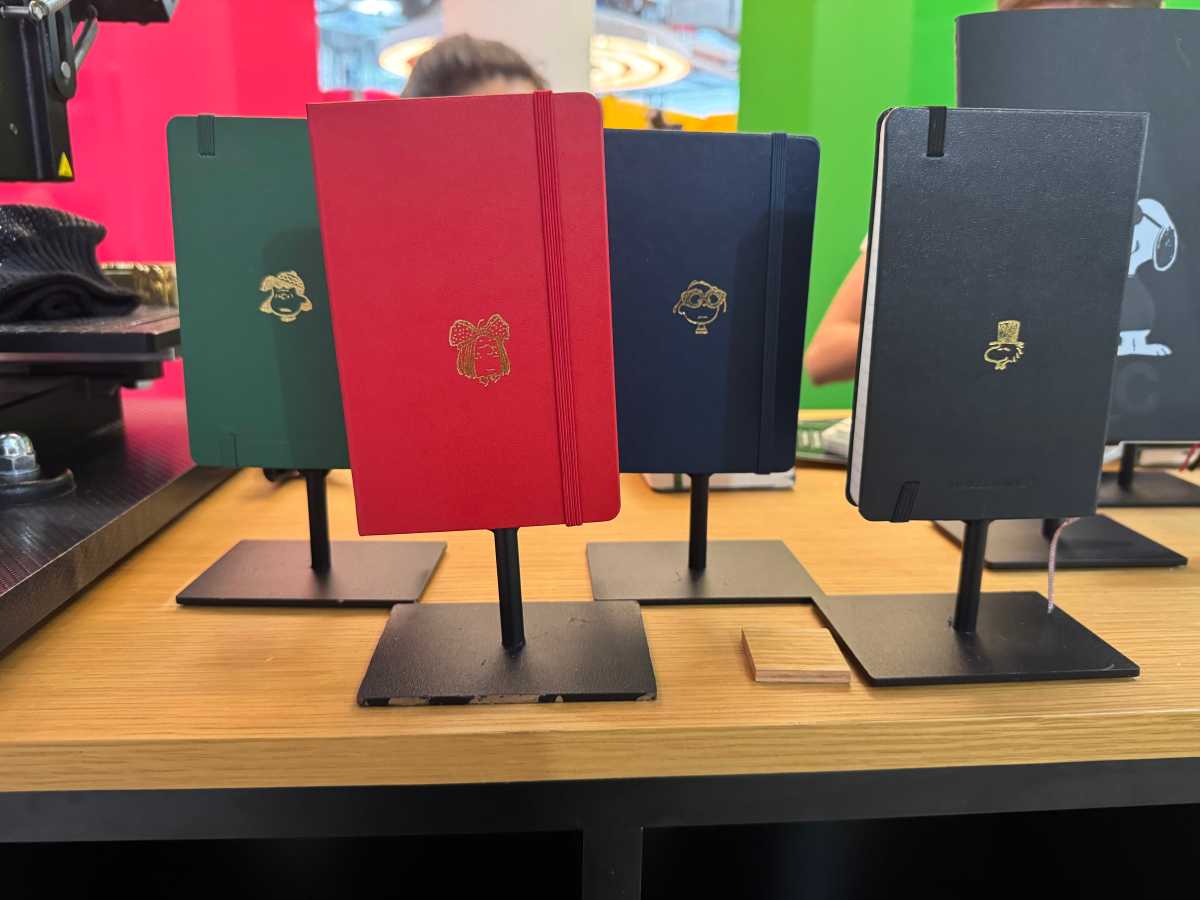 Guests can get an embossed Moleskin notebook.