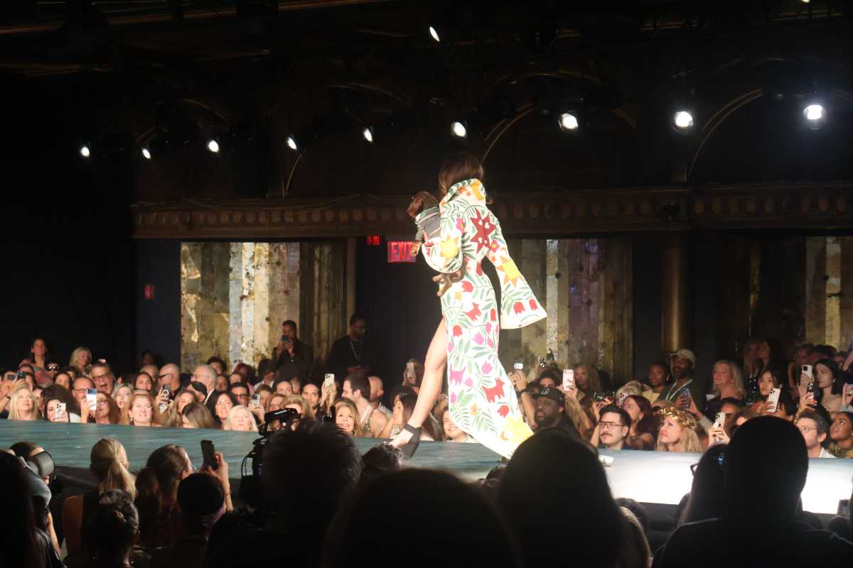 a model walks with a dog for Designer  Hot Girl Quilting
