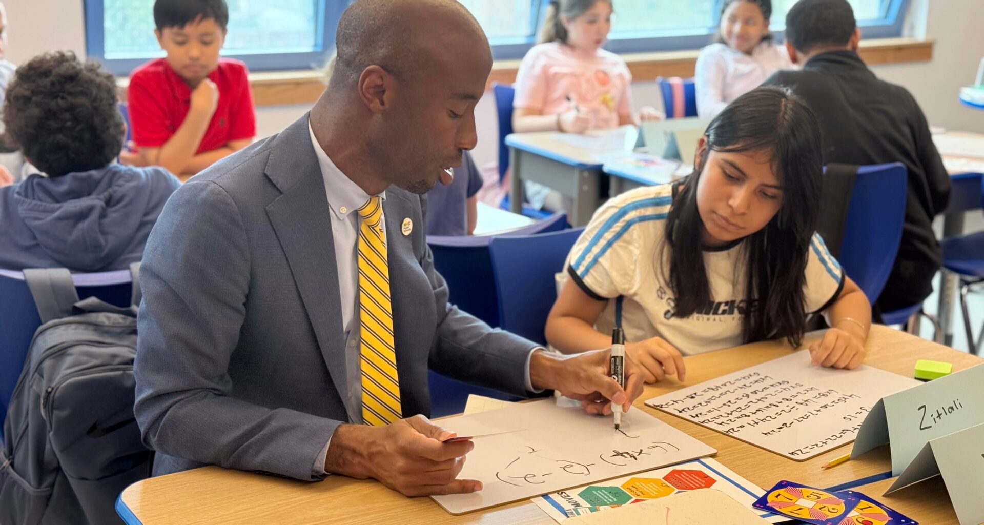 Young NYC school children prepare for a new classroom experience with less screen time