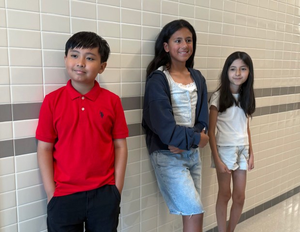 P.S/I.S. 206 students Zay, Yasmina and Priscilla are pictured at their Brooklyn school on Thursday, Sept. 10, 2026, the first day back to classes. (Cayla Bamberger / New York Daily News)