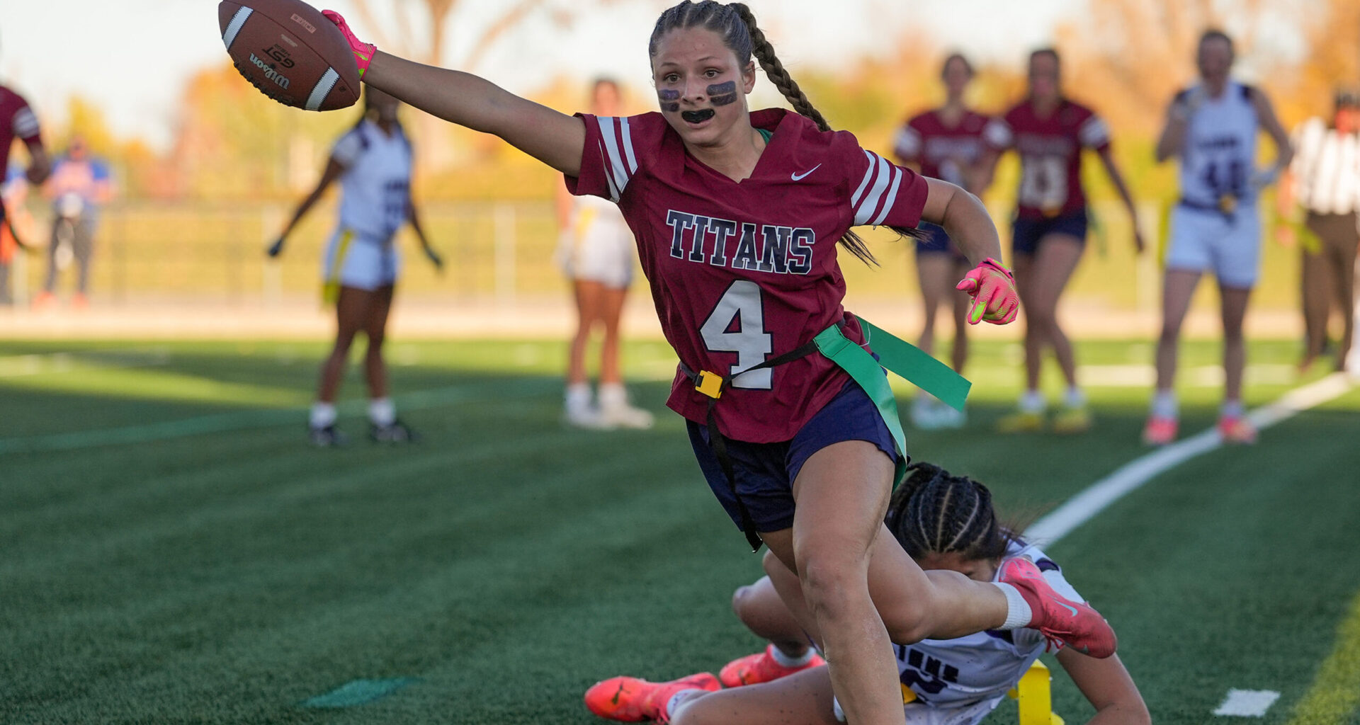 The Classical Academy's Brooklyn Blair (4) stretches for a touchdown during the game between the Titans and the Mountain Lions on Saturday, October 25, 2025 at Trailblazer Stadium in Lakewood, Colorado. Joshua Genz, Special to the Gazette