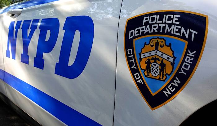 Woman randomly stabs 2 people in New York City's Times Square, killing 1, then is killed by police