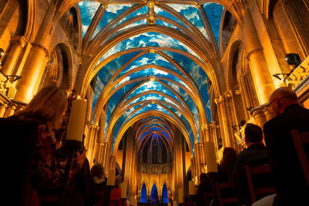 North America’s largest Gothic cathedral is hosting a dazzling light show in the heart of NYC, with stunning projections, live music, and a choir