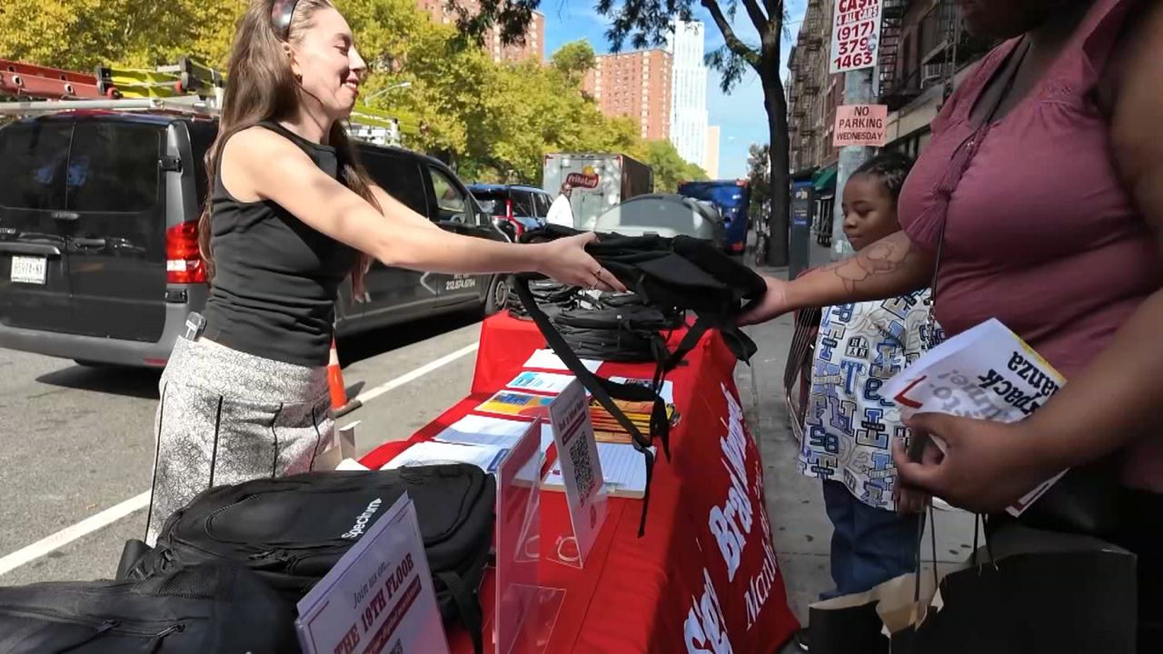 Manhattan borough president and Spectrum give away backpacks