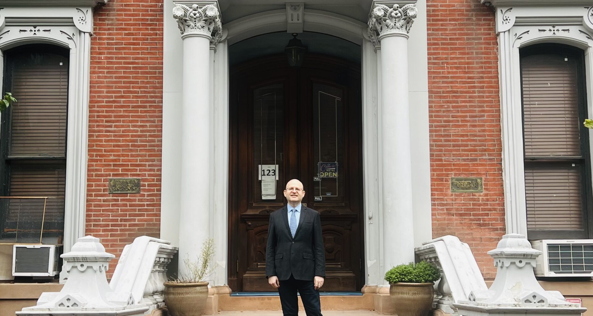 Vaygen in front of the BBA’s long-time headquarters, 123 Remsen St., in Brooklyn Heights. Photo: Wayne Daren Schneiderman/Brooklyn Eagle
