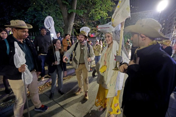 The Rat Queen chats with the Rat Rangers on the Boston rat tour. (Stuart Cahill/Boston Herald)