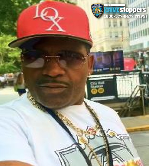 Mark Washington, 55, is wanted in connection with the death of Angelique Apostol, 38, who was found dead inside a Queens home on June 24. (DCPI)
