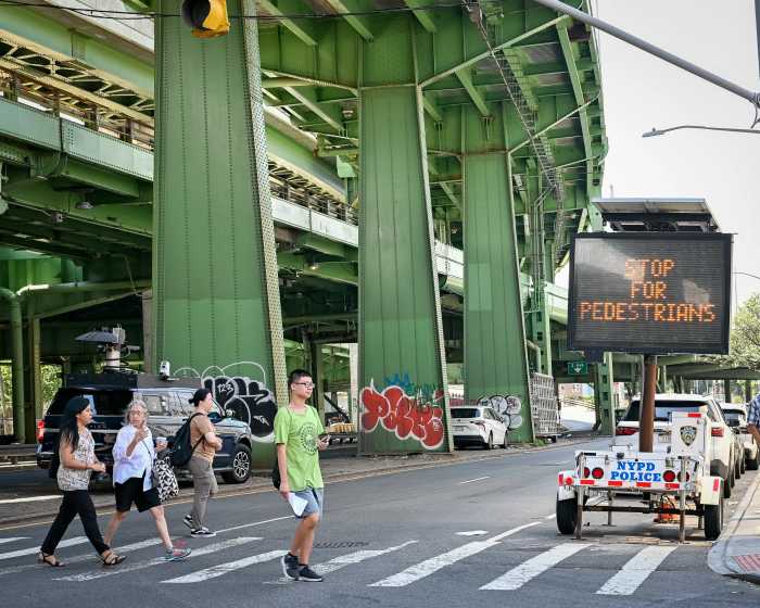 People crossing third avenue