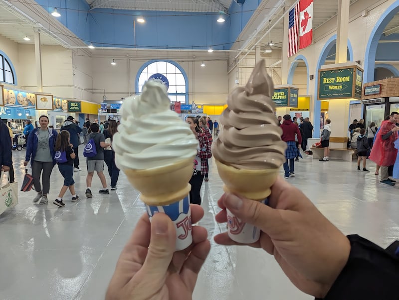 Hands holding ice cream cones