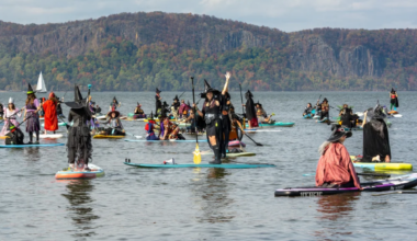 This one-day-only Halloween festival 1 hour from NYC features hundreds of witches paddleboarding in NY's real-life spooky town