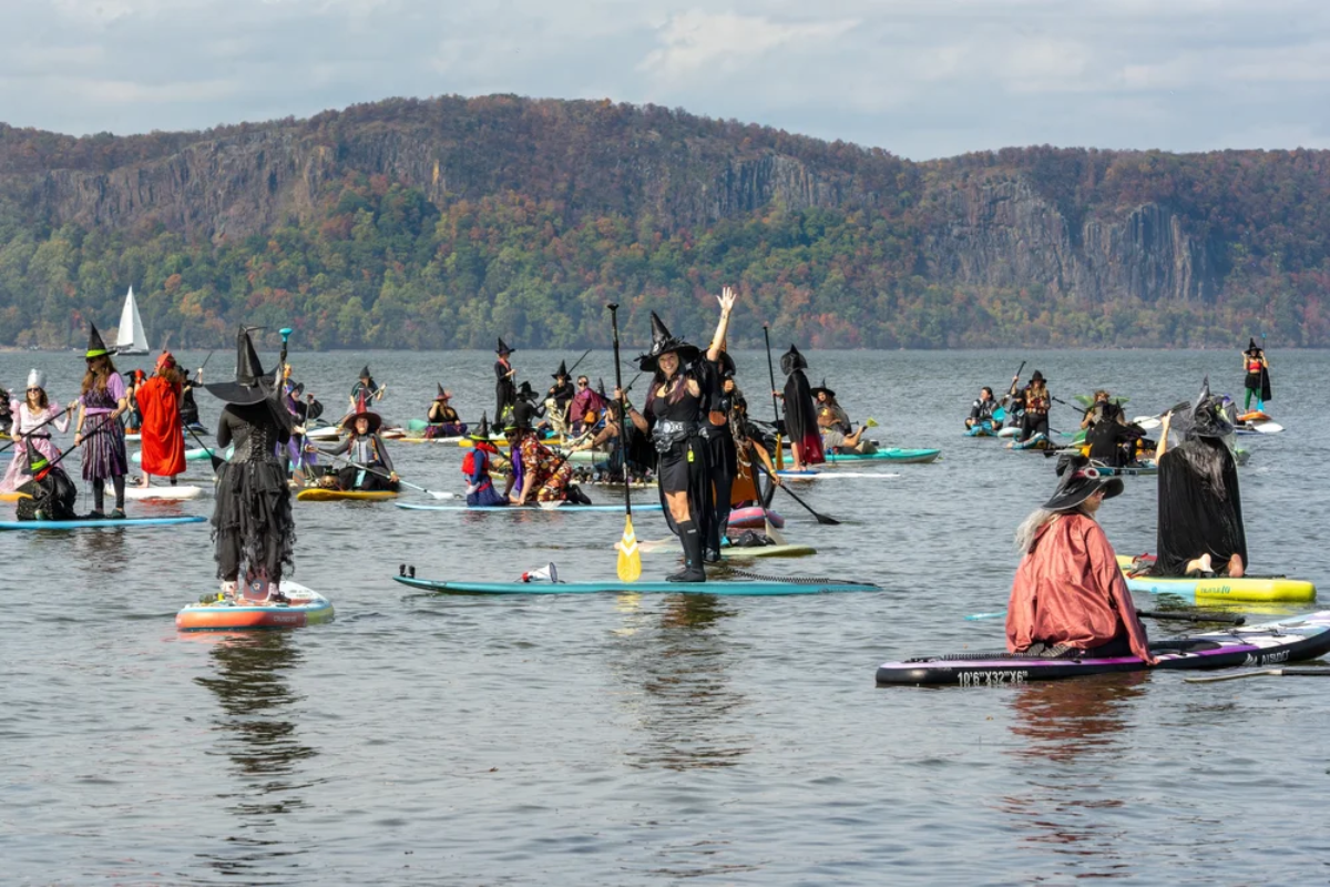 This one-day-only Halloween festival 1 hour from NYC features hundreds of witches paddleboarding in NY's real-life spooky town