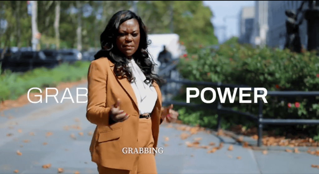 A screenshot of Rodneyse Bichotte-Hermelyn with the caption "GRABBING POWER"